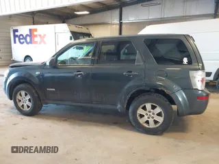 2008 Mercury Mariner with VIN 4M2CU81158KJ14013, listed as a IAAI auction lot 41305863 with 229,672 mi miles and . Bid and sale history available at DreamBid. Image 14.