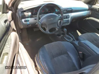 2006 Chrysler Sebring Touring z VIN 1C3EL55R86N197825, wystawiony jako Copart lot #56661055 z przebiegiem 148 514 mil mil oraz Szkody całkowita. Historia ofert i sprzedaży dostępna na DreamBid. Obrazek 8.