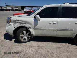 2015 Honda Pilot Touring with VIN 5FNYF3H94FB007744, listed as a Copart auction lot 49512015 with 122,912 mi miles and Salvage Title. Bid and sale history available at carsss.com. Image 12.