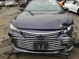 2021 Toyota Avalon Hybrid XLE z VIN 4T1AA1AB1MU003264, wystawiony jako Copart lot #73299832 z przebiegiem 107 735 mil mil oraz . Historia ofert i sprzedaży dostępna na DreamBid. Obrazek 5.