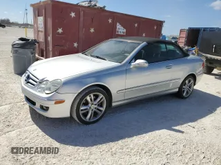 2007 Mercedes-Benz CLK-Class 3.5L with VIN WDBTK56FX7F206030, listed as a Copart auction lot 77271194 with 155,157 mi miles and Salvage Title. Bid and sale history available at carsss.com. Image 1.