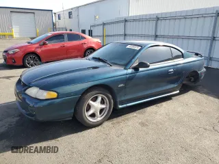 1997 Ford Mustang GT with VIN 1FALP42X0VF181072, listed as a Copart auction lot 49300975 with 193,570 mi miles and Clean title. Bid and sale history available at DreamBid. Image 1.