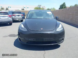 2021 Tesla Model Y Performance with VIN 5YJYGDEFXMF215895, listed as a IAAI auction lot 41622716 with 72,596 mi miles. Bid and sale history available at carsss.com. Image 12.