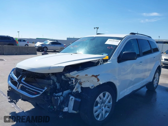 2019 Dodge Journey SE Value with VIN 3C4PDCAB1KT868065, listed as a IAAI auction lot 41642318 with 97,735 mi miles and . Bid and sale history available at DreamBid. Image 6.