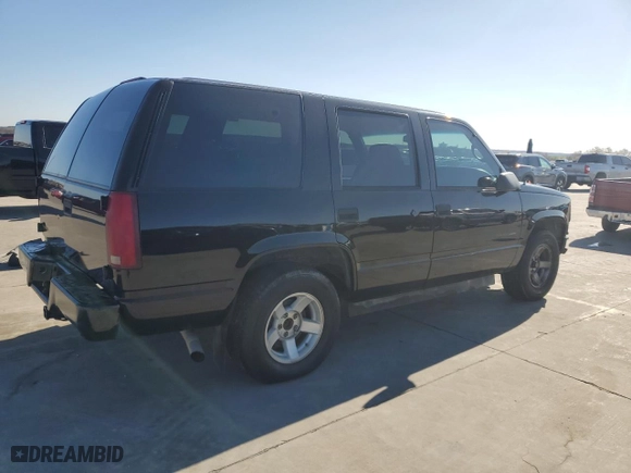 2000 Chevrolet Tahoe Limited with VIN 1GNEC13R4YR141259, listed as a Copart auction lot 85578904 with 195,944 mi miles and Salvage Title. Bid and sale history available at carsss.com. Image 3.