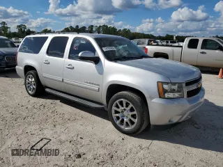 2011 Chevrolet Suburban LS with VIN 1GNSCHE08BR238949, listed as a Copart auction lot 74702004 with 147,451 mi miles and Salvage Title. Bid and sale history available at carsss.com. Image 4.