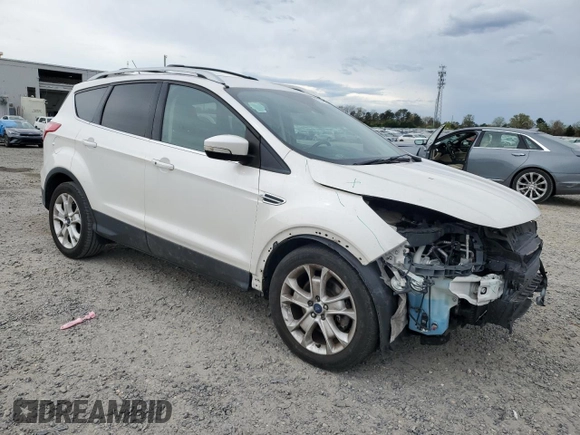 2016 Ford Escape Titanium with VIN 1FMCU9JX6GUB85980, listed as a Copart auction lot 51748715 with 129,537 mi miles and Salvage Title. Bid and sale history available at carsss.com. Image 4.