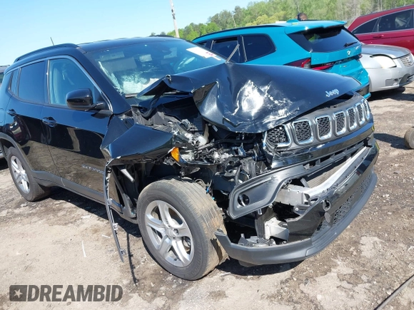 2023 Jeep Compass Latitude with VIN 3C4NJDBN0PT536141, listed as a IAAI auction lot 41974206 with 54,052 mi miles and . Bid and sale history available at DreamBid. Image 1.
