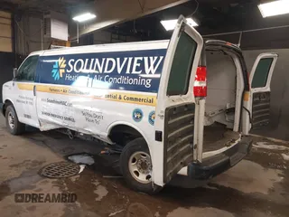 2020 Chevrolet Express Cargo Van with VIN 1GCWGBFB4L1205443, listed as a IAAI auction lot 41612714 with 87,883 mi miles. Bid and sale history available at carsss.com. Image 3.