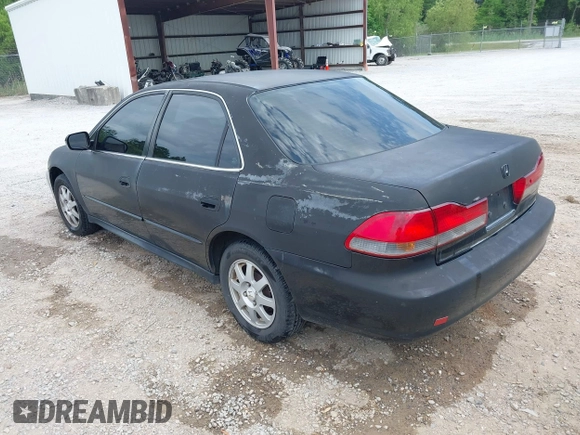 2002 Honda Accord SE z VIN 1HGCG668X2A171099, wystawiony jako IAAI lot #42081358 z przebiegiem 215 915 mil mil oraz . Historia ofert i sprzedaży dostępna na DreamBid. Obrazek 3.