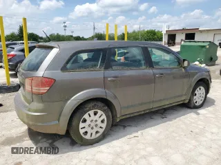 2013 Dodge Journey SE z VIN 3C4PDCAB0DT728950, wystawiony jako Copart lot #57525305 z przebiegiem 181 414 mil mil oraz Czysty tytuł • Clean title. Historia ofert i sprzedaży dostępna na DreamBid. Obrazek 3.