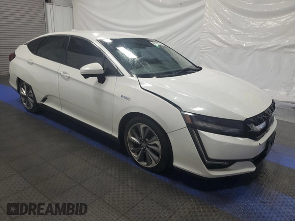 2018 Honda Clarity Plug-In Hybrid with VIN JHMZC5F16JC013412, listed as a Copart auction lot 79014864 with 83,784 mi miles and Clean Title. Bid and sale history available at carsss.com. Image 4.