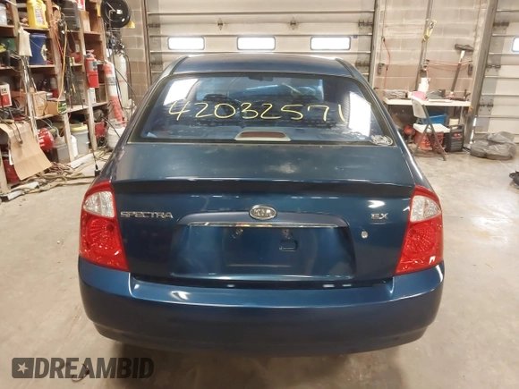 2004 Kia Spectra LX with VIN KNAFE121145012249, listed as a IAAI auction lot 42032571 with 146,748 mi miles. Bid and sale history available at carsss.com. Image 17.
