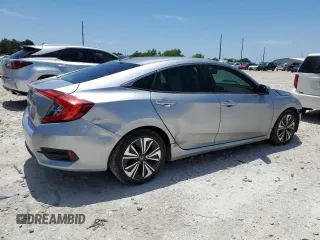 2017 Honda Civic EX-L with VIN 19XFC1F7XHE030606, listed as a Copart auction lot 56536095 with 101,465 mi miles and Salvage title. Bid and sale history available at DreamBid. Image 3.