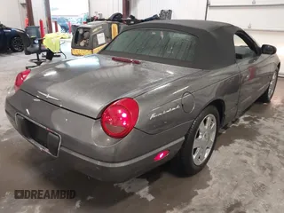 2003 Ford Thunderbird Deluxe with VIN 1FAHP60A53Y113819, listed as a IAAI auction lot 41724732 with Not Provided miles and . Bid and sale history available at DreamBid. Image 4.