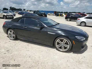 2018 BMW 6 Series 650i with VIN WBA6F5C5XJD997058, listed as a Copart auction lot 70083514 with 0 mi miles and Salvage Title. Bid and sale history available at carsss.com. Image 4.
