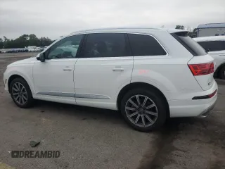 2019 Audi Q7 Premium Plus with VIN WA1LHAF79KD017451, listed as a Copart auction lot 61527125 with 129,180 mi miles and Salvage title. Bid and sale history available at DreamBid. Image 2.