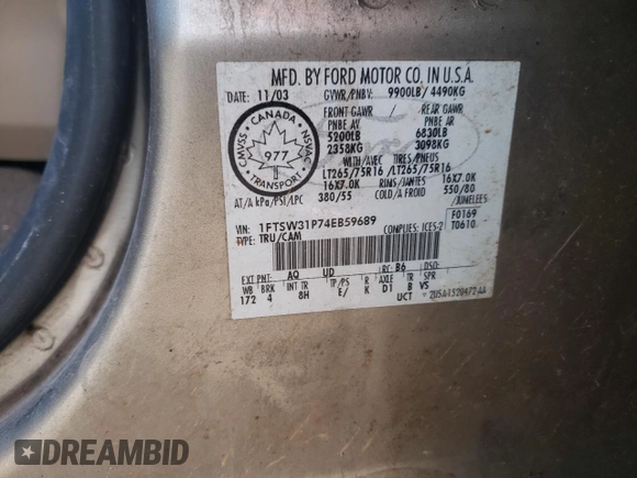 2004 Ford F-350 XL z VIN 1FTSW31P74EB59689, wystawiony jako Copart lot #87101184 z przebiegiem 240 134 mil mil oraz Szkoda całkowita • Salvage title. Historia ofert i sprzedaży dostępna na DreamBid. Obrazek 13.