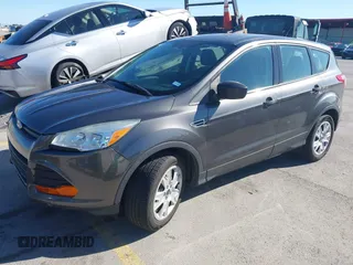 2015 Ford Escape S with VIN 1FMCU0F77FUA91187, listed as a IAAI auction lot 42088797 with 113,863 mi miles. Bid and sale history available at carsss.com. Image 2.