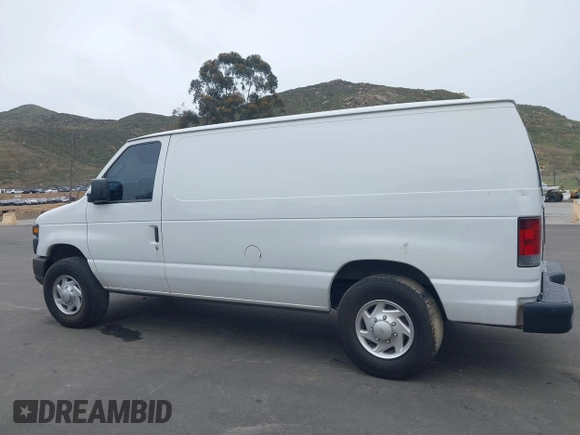 2012 Ford Econoline Cargo Commercial with VIN 1FTNE1EW6CDA42261, listed as a IAAI auction lot 41750879 with 249,408 mi miles and . Bid and sale history available at carsss.com. Image 14.