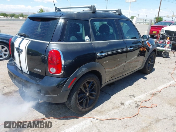 2012 MINI Countryman with VIN WMWZB3C51CWM05034, listed as a IAAI auction lot 42235437 with 131,280 mi miles and . Bid and sale history available at DreamBid. Image 4.
