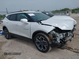 2021 Chevrolet Blazer RS z VIN 3GNKBKRS9MS529990, wystawiony jako IAAI lot #42440982 z przebiegiem 51 701 mil mil oraz . Historia ofert i sprzedaży dostępna na DreamBid. Obrazek 1.