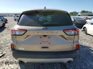 2020 Ford Escape SE z VIN 1FMCU9G69LUB63156, wystawiony jako Copart lot #57412545 z przebiegiem 82 230 mil mil oraz Czysty tytuł • Clean title. Historia ofert i sprzedaży dostępna na DreamBid. Obrazek 6.