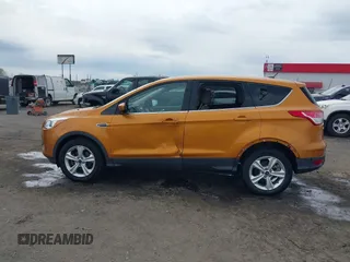 2016 Ford Escape SE with VIN 1FMCU0GX3GUB75572, listed as a IAAI auction lot 41869920 with 154,586 mi miles and . Bid and sale history available at carsss.com. Image 14.