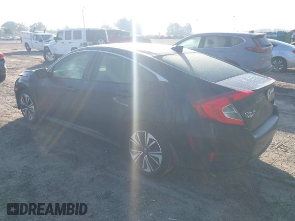 2017 Honda Civic Sedan EX-L with VIN 19XFC1F71HE012575, listed as a IAAI auction lot 41997229 with 131,340 mi miles. Bid and sale history available at carsss.com. Image 3.