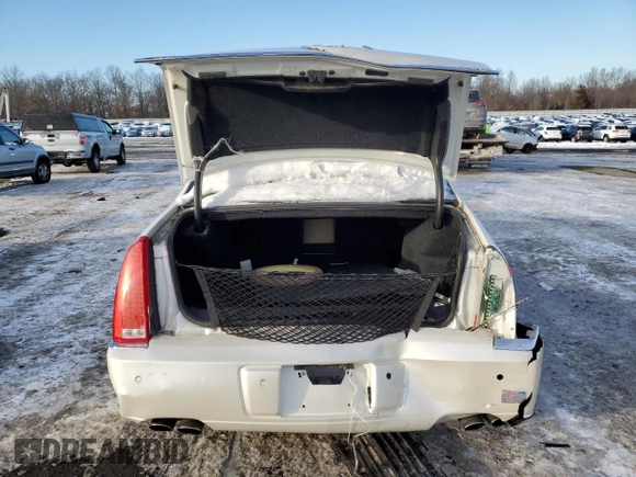 2007 Cadillac DTS Luxury I z VIN 1G6KD57Y57U223002, wystawiony jako Copart lot #87247984 z przebiegiem Nie podano mil oraz Szkoda całkowita • Salvage title. Historia ofert i sprzedaży dostępna na DreamBid. Obrazek 6.