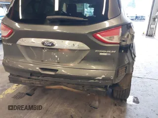2016 Ford Escape Titanium with VIN 1FMCU9J92GUB63525, listed as a IAAI auction lot 41469824 with 156,773 mi miles. Bid and sale history available at carsss.com. Image 20.