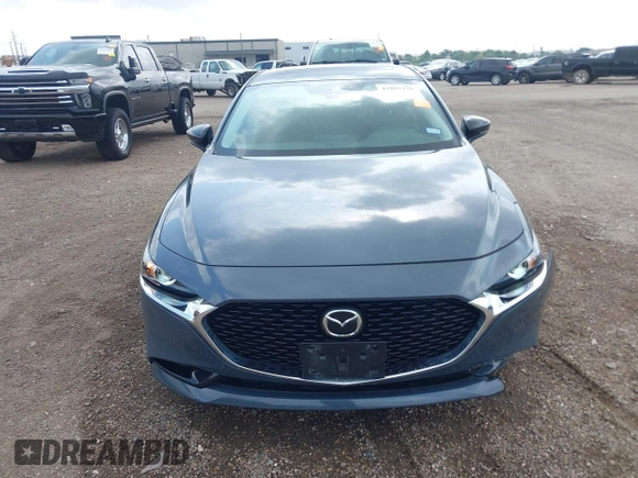 2022 Mazda 3 Carbon Edition z VIN 3MZBPACL7NM313242, wystawiony jako IAAI lot #42095279 z przebiegiem 30 787 mil mil oraz . Historia ofert i sprzedaży dostępna na DreamBid. Obrazek 12.