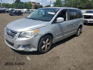 2011 Volkswagen Routan SE with VIN 2V4RW3DG7BR766580, listed as a Copart auction lot 62161235 with 158,231 mi miles and Salvage title. Bid and sale history available at DreamBid. Image 1.