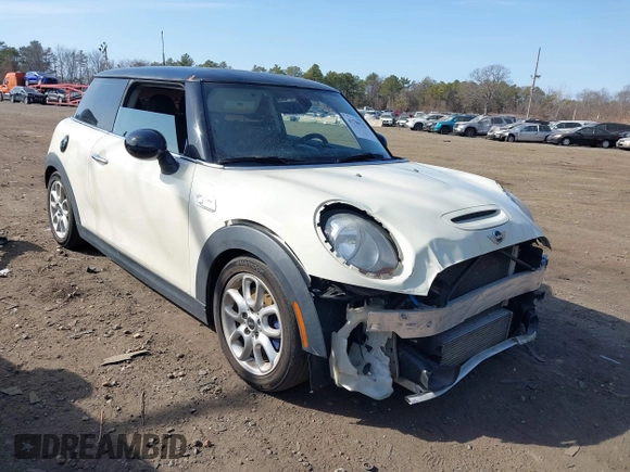 2014 MINI Hardtop S with VIN WMWXM7C57ET987122, listed as a IAAI auction lot 41780127 with 78,567 mi miles and . Bid and sale history available at DreamBid. Image 1.