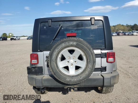 2013 Jeep Wrangler Unlimited Sport z VIN 1C4BJWDG7DL597491, wystawiony jako Copart lot #50719435 z przebiegiem Nie podano mil oraz Szkoda całkowita • Salvage title. Historia ofert i sprzedaży dostępna na DreamBid. Obrazek 6.