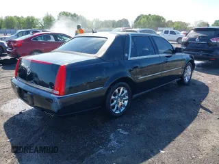 2008 Cadillac DTS 1SC with VIN 1G6KD57Y08U184384, listed as a IAAI auction lot 41974882 with 158,372 mi miles and . Bid and sale history available at carsss.com. Image 4.