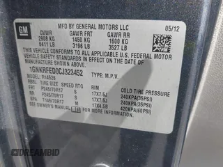 2012 Chevrolet Traverse LS with VIN 1GNKRFED0CJ323452, listed as a IAAI auction lot 39494216 with 188,897 mi miles and . Bid and sale history available at DreamBid. Image 9.