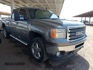 2014 GMC Sierra 2500HD SLT with VIN 1GT121E85EF136406, listed as a IAAI auction lot 42456047 with 89,414 mi miles and . Bid and sale history available at DreamBid. Image 1.