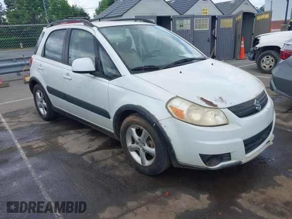2007 Suzuki SX4 with VIN JS2YB413975105927, listed as a IAAI auction lot 42136696 with 232,480 mi miles. Bid and sale history available at carsss.com. Image 1.