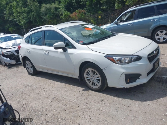 2017 Subaru Impreza Premium with VIN 4S3GTAD67H3748698, listed as a IAAI auction lot 39917558 with 56,945 mi miles. Bid and sale history available at carsss.com. Image 1.