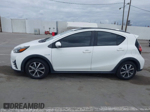 2018 Toyota Prius One with VIN JTDKDTB32J1599677, listed as a IAAI auction lot 42041923 with 83,384 mi miles and . Bid and sale history available at DreamBid. Image 14.