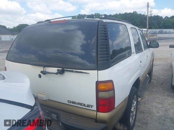 2001 Chevrolet Tahoe LS z VIN 1GNEC13T11R162930, wystawiony jako IAAI lot #42373226 z przebiegiem 335 448 mil mil oraz . Historia ofert i sprzedaży dostępna na DreamBid. Obrazek 4.