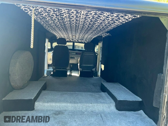 1953 Ford Econoline Cargo with VIN P35D3H37167, listed as a Copart auction lot 52647515 with 147,774 mi miles and Clean Title. Bid and sale history available at DreamBid. Image 9.