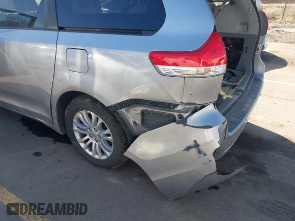 2011 Toyota Sienna XLE AAS with VIN 5TDYK3DC4BS014986, listed as a IAAI auction lot 41763681 with 169,619 mi miles. Bid and sale history available at carsss.com. Image 6.