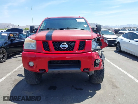 2011 Nissan Titan Pro-4X z VIN 1N6BA0ECXBN317554, wystawiony jako IAAI lot #42310942 z przebiegiem 152 264 mil mil oraz . Historia ofert i sprzedaży dostępna na DreamBid. Obrazek 12.