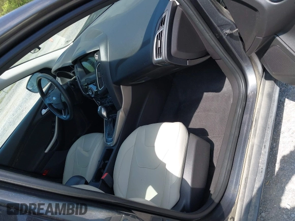 2018 Ford Focus Titanium с VIN 1FADP3J22JL314642, выставлен на аукционе IAAI как лот 42128194 с пробегом 62 787 миль миль и . История ставок и продаж доступна на DreamBid. Изображение 5.