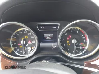 2014 Mercedes-Benz GL-Class GL 550 with VIN 4JGDF7DE1EA274612, listed as a IAAI auction lot 41710174 with 105,094 mi miles. Bid and sale history available at carsss.com. Image 7.