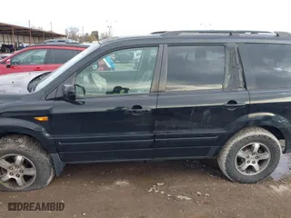 2007 Honda Pilot EX-L with VIN 5FNYF28557B027087, listed as a IAAI auction lot 41356244 with 183,923 mi miles. Bid and sale history available at carsss.com. Image 15.