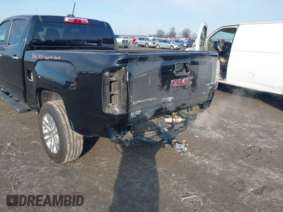 2015 GMC Canyon 4WD SLT with VIN 1GTG6CE34F1153369, listed as a IAAI auction lot 41277810 with 135,821 mi miles. Bid and sale history available at carsss.com. Image 6.