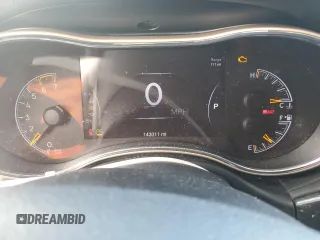 2014 Jeep Grand Cherokee Overland with VIN 1C4RJFCT2EC106002, listed as a Copart auction lot 48763675 with 143,011 mi miles and Salvage Title. Bid and sale history available at DreamBid. Image 9.